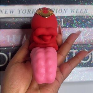 Red and Pink Portable Tool with Playful Design